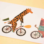 Londji tattoo illustration of animals riding bicycles on a white background