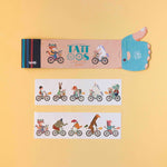Londji bike tattoos with illustrations of toys on a yellow background