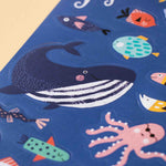 Londji stickers of colorful sea creature illustrations on a blue background