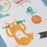 Londji sheet of colorful cat-themed tattoos with various designs on a white background.