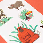 Londji set of colorful animal tattoos on a white sheet with a red background