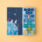 Londji stacking game with space-themed illustration and colorful buttons on a yellow background