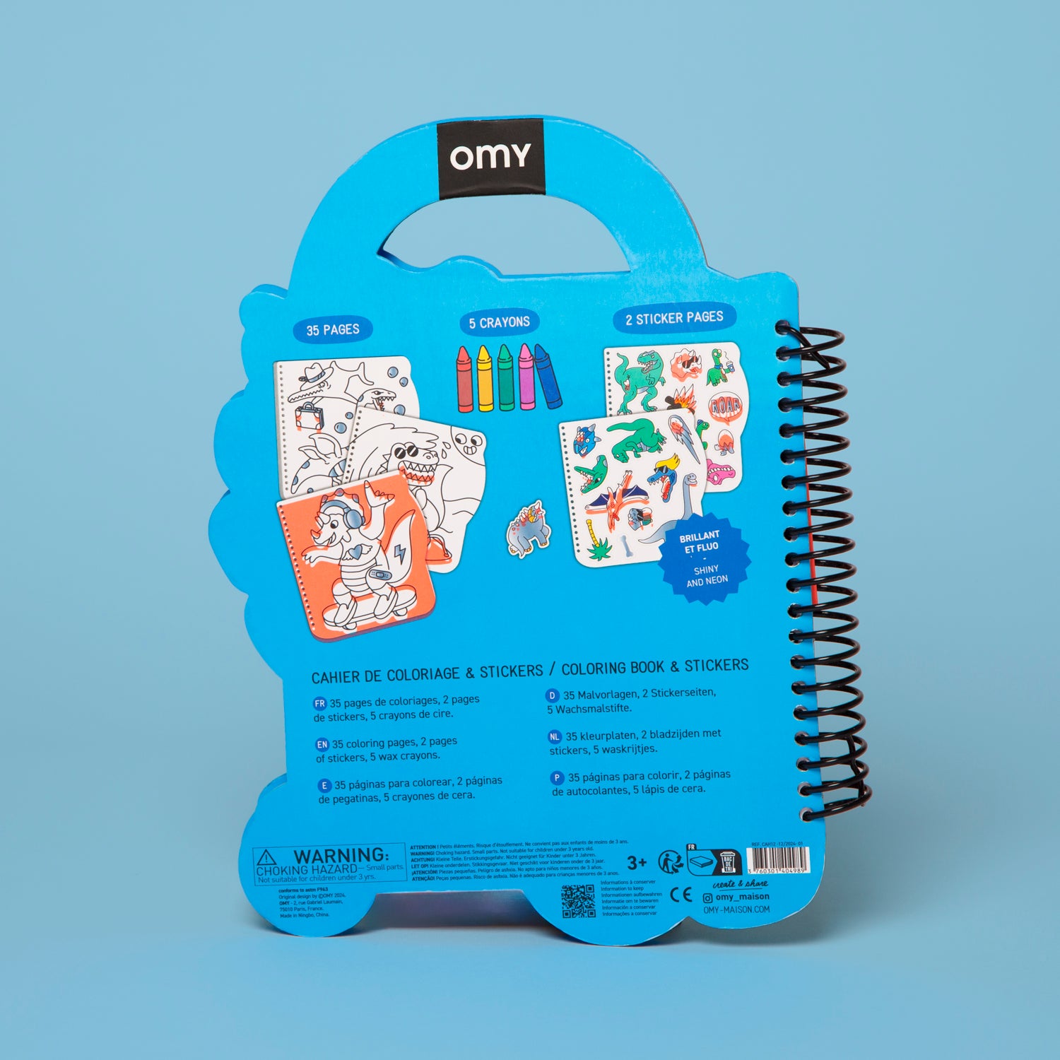 Blue packaging of a coloring book and stickers set with OMY branding on a light blue background.