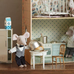 Maileg mice toys playing in a miniature dollhouse kitchen setting.