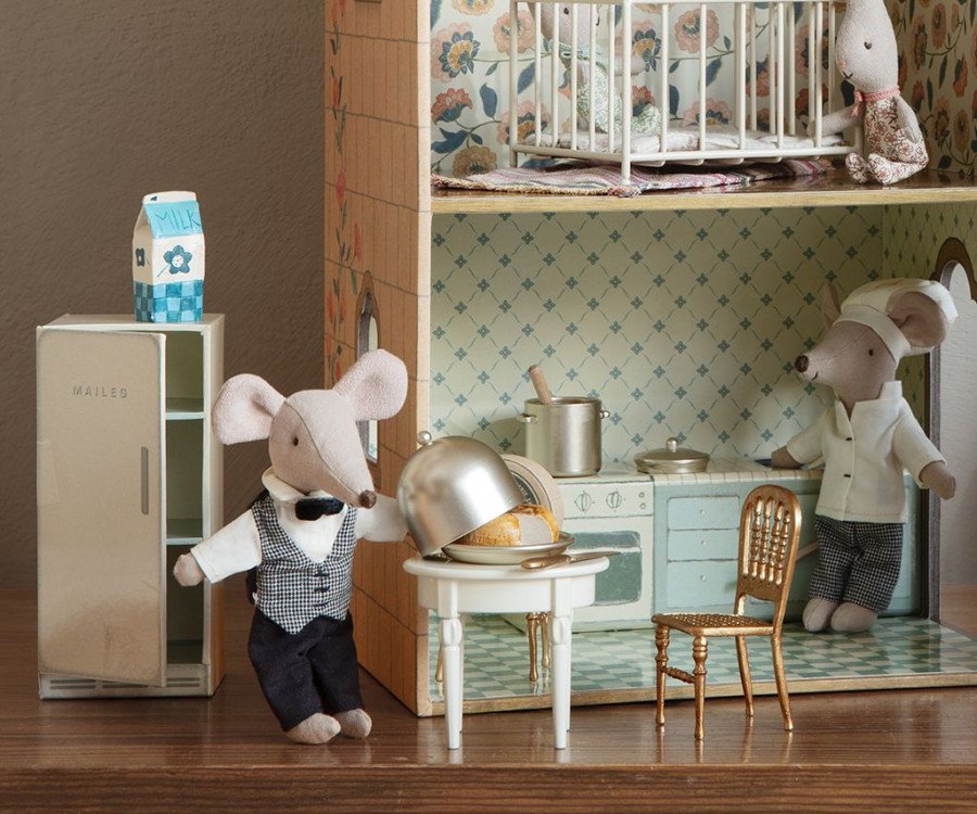 Maileg mice toys playing in a miniature dollhouse kitchen setting.