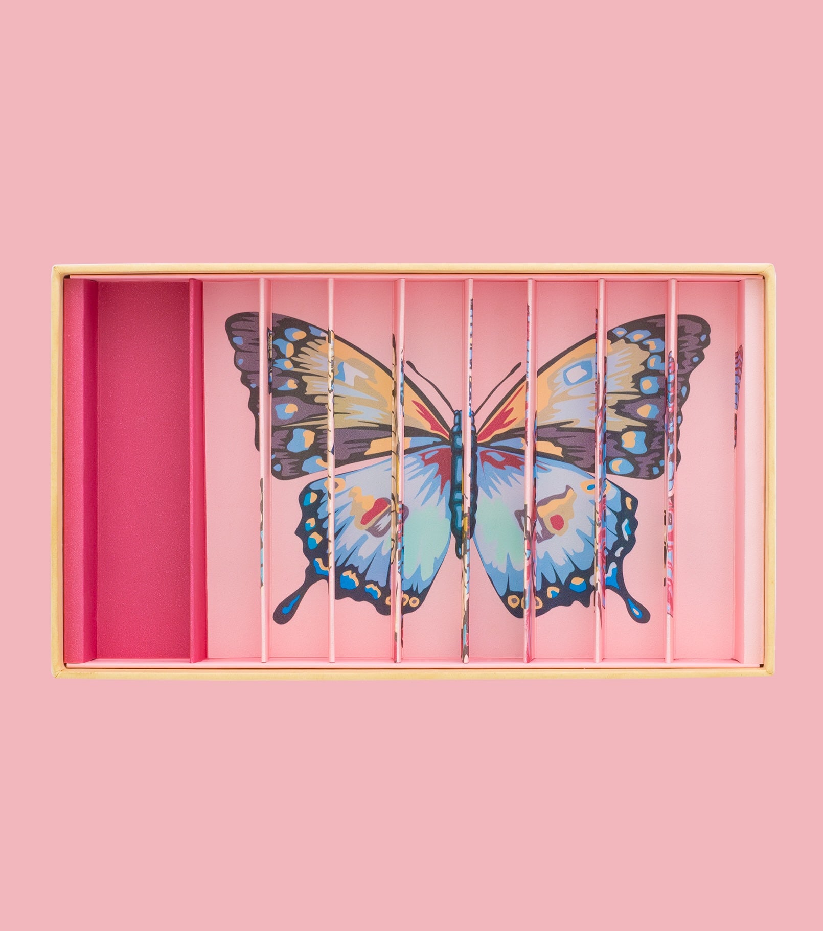 Billes & Co marble box with butterfly design on a pink background