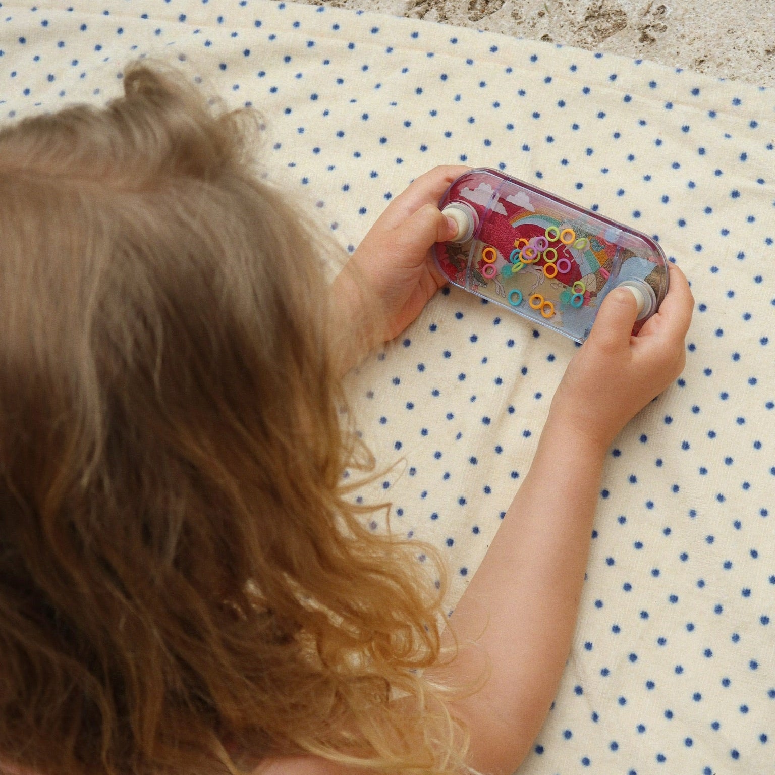 Konges Slojd Water Ring Game Unicorn at play