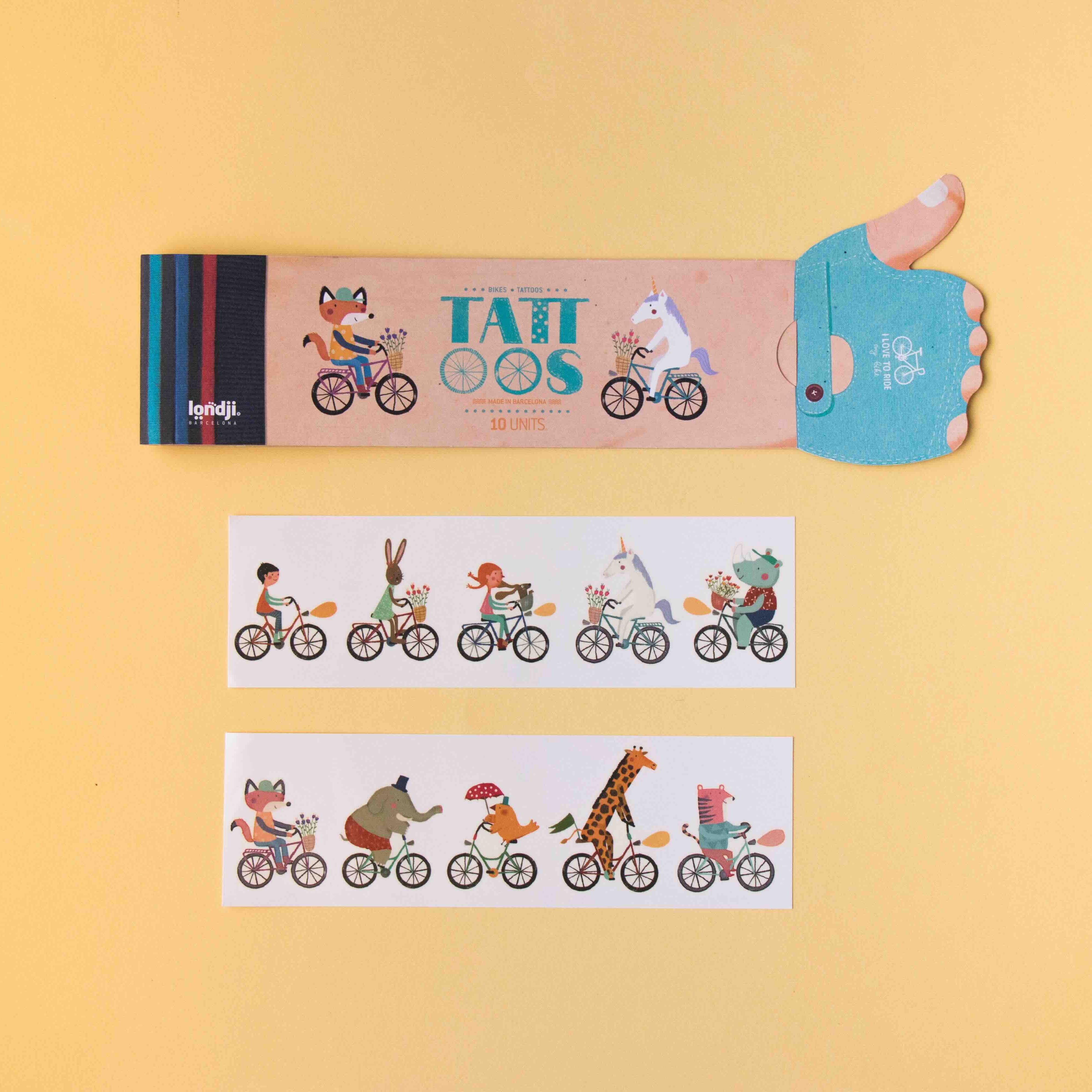 Londji bike tattoos with illustrations of toys on a yellow background