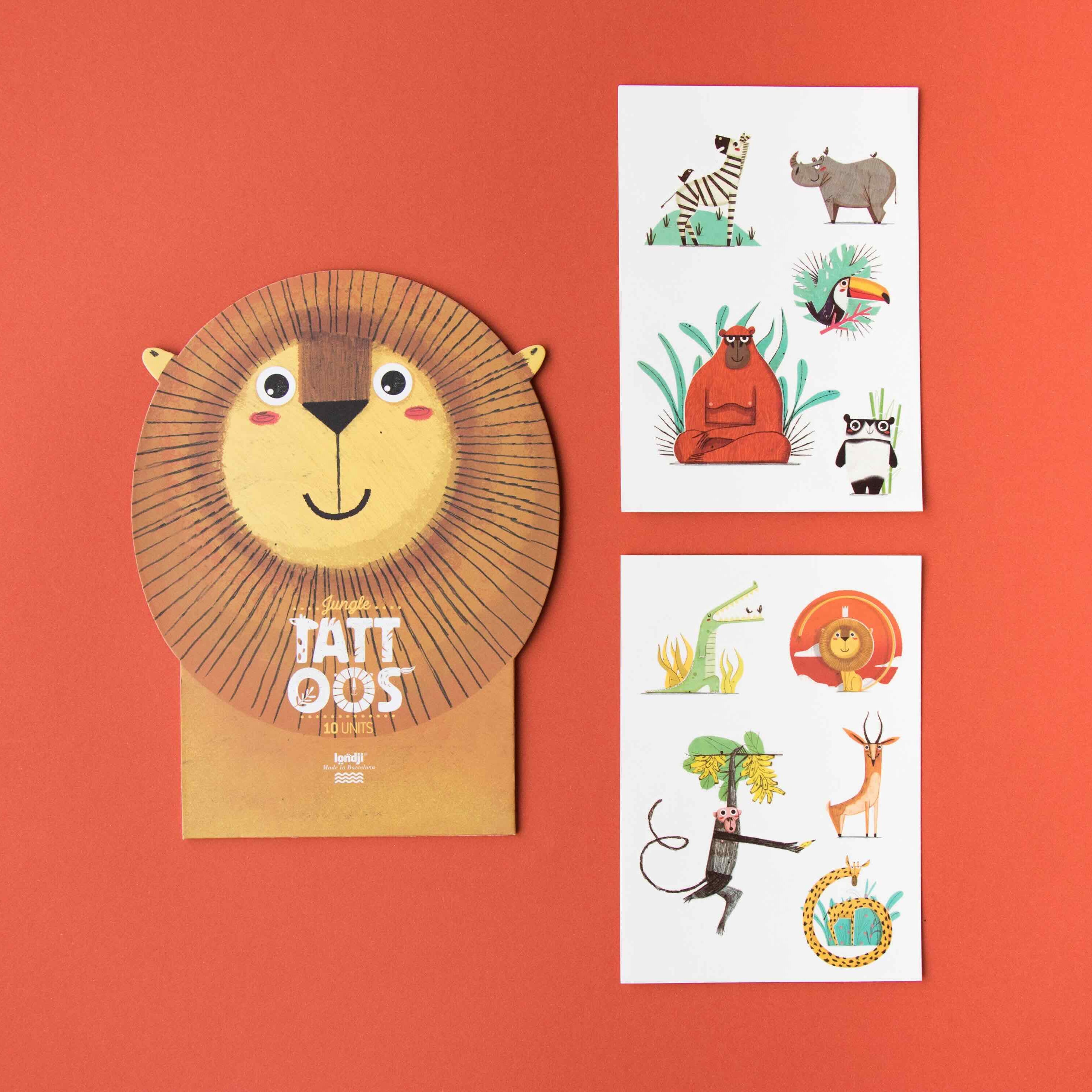 Londji set of animal-themed tattoos and a lion-shaped packaging on an orange background