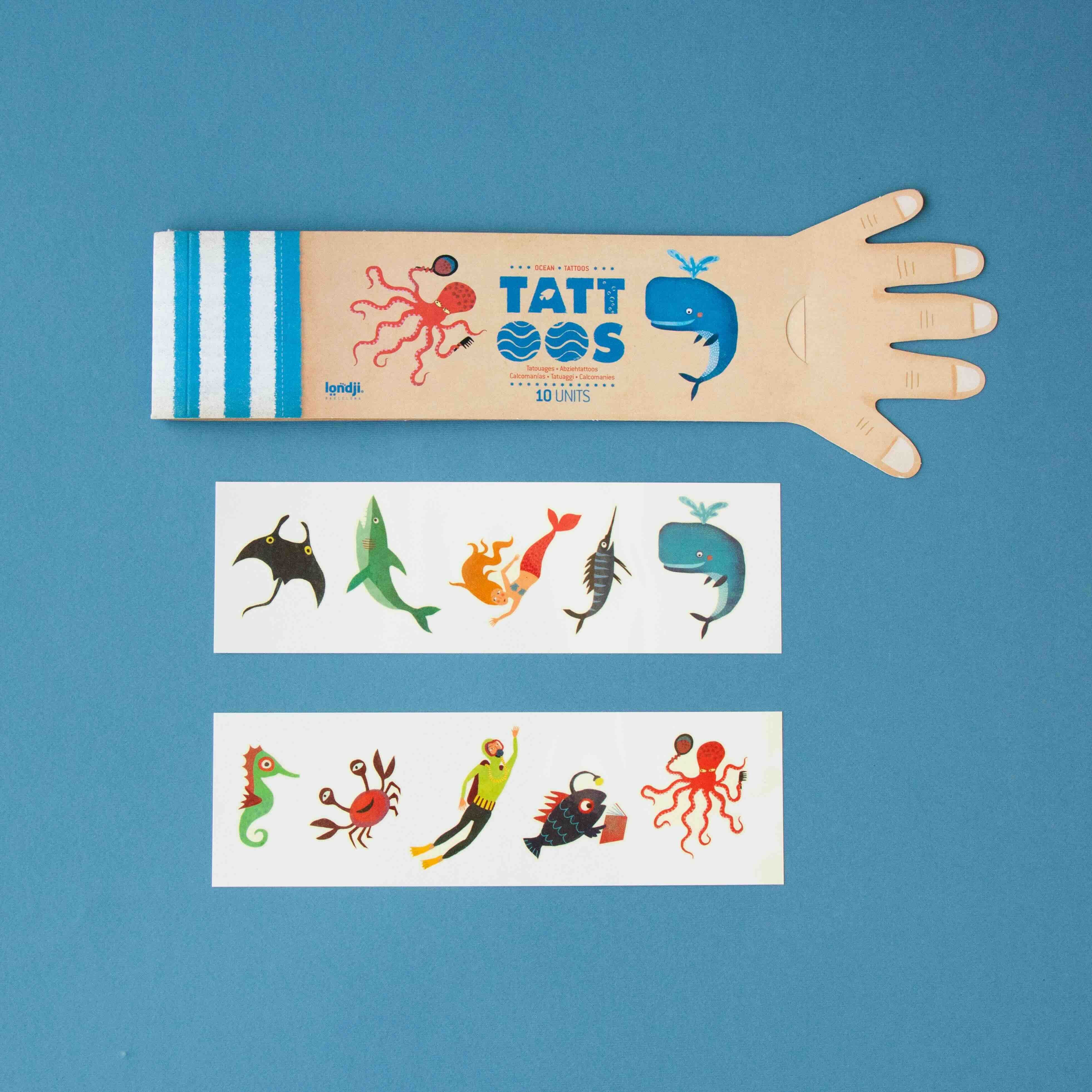 Londji tattoo set with ocean animal designs on a blue background