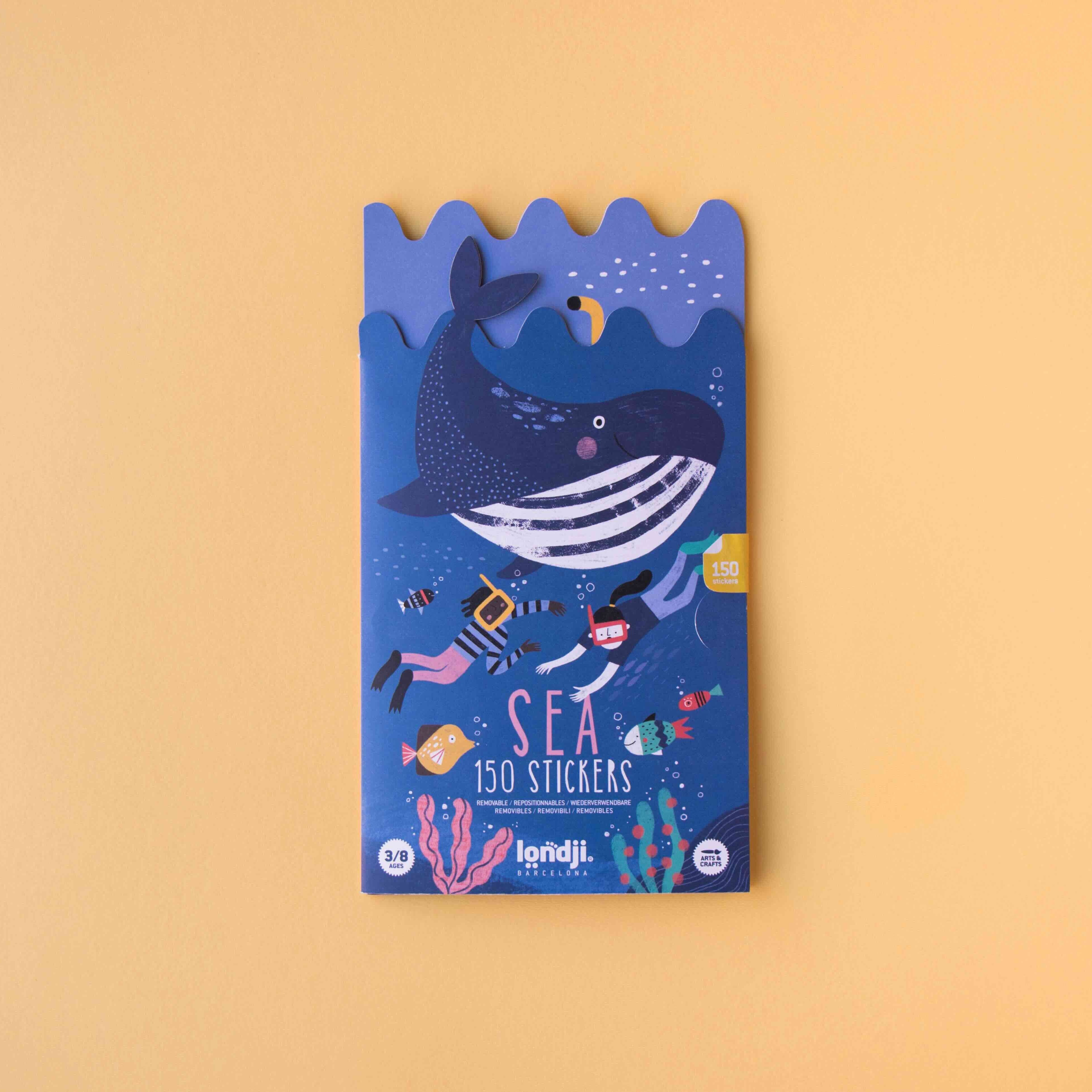 Londji pack of stickers with a whale illustration on a gradient background