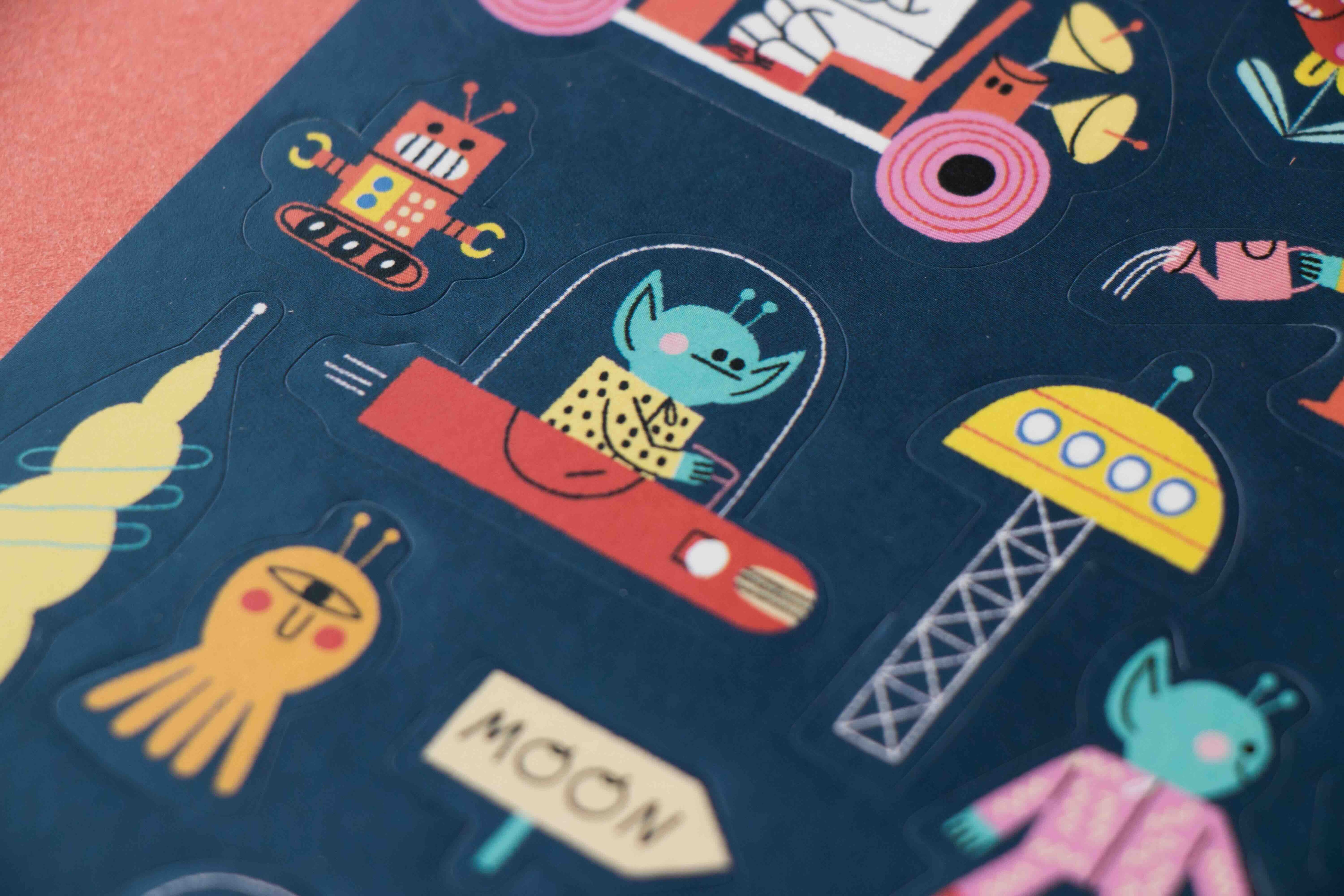 Londji colorful children's stickers with space-themed designs on a dark blue background.