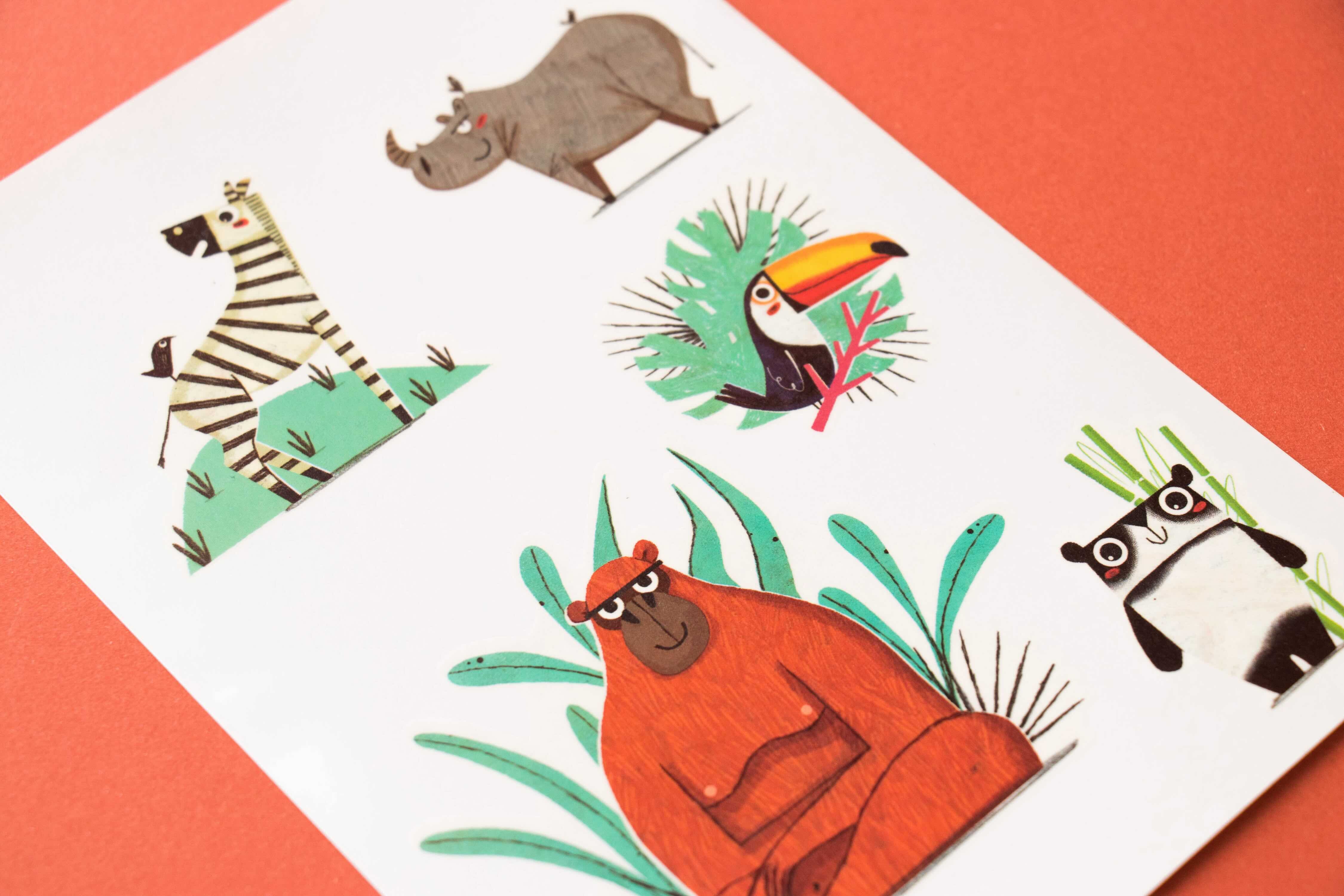 Londji set of colorful animal tattoos on a white sheet with a red background