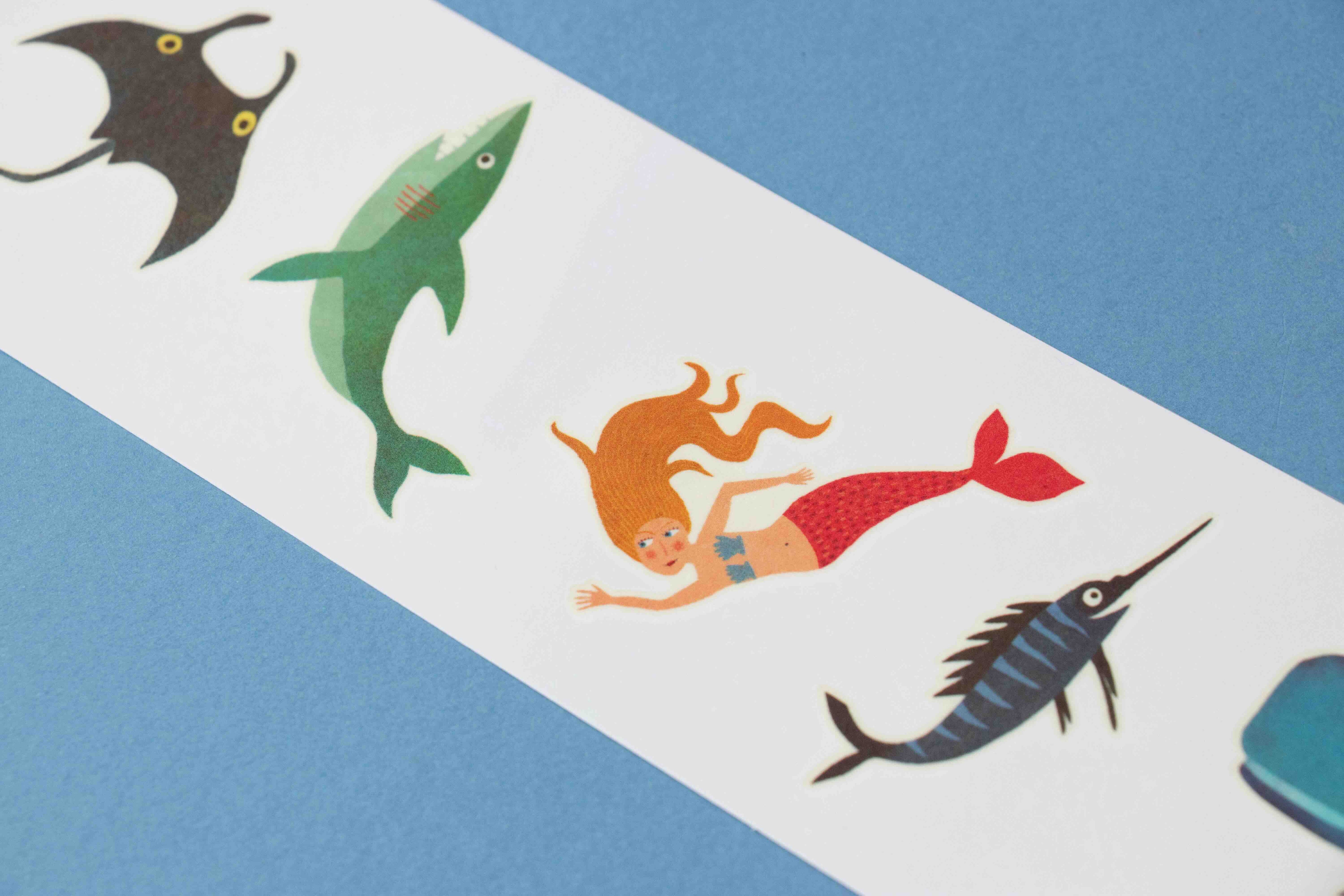 Londji colorful tattoos illustrations of a mermaid and fish on a blue and white striped background