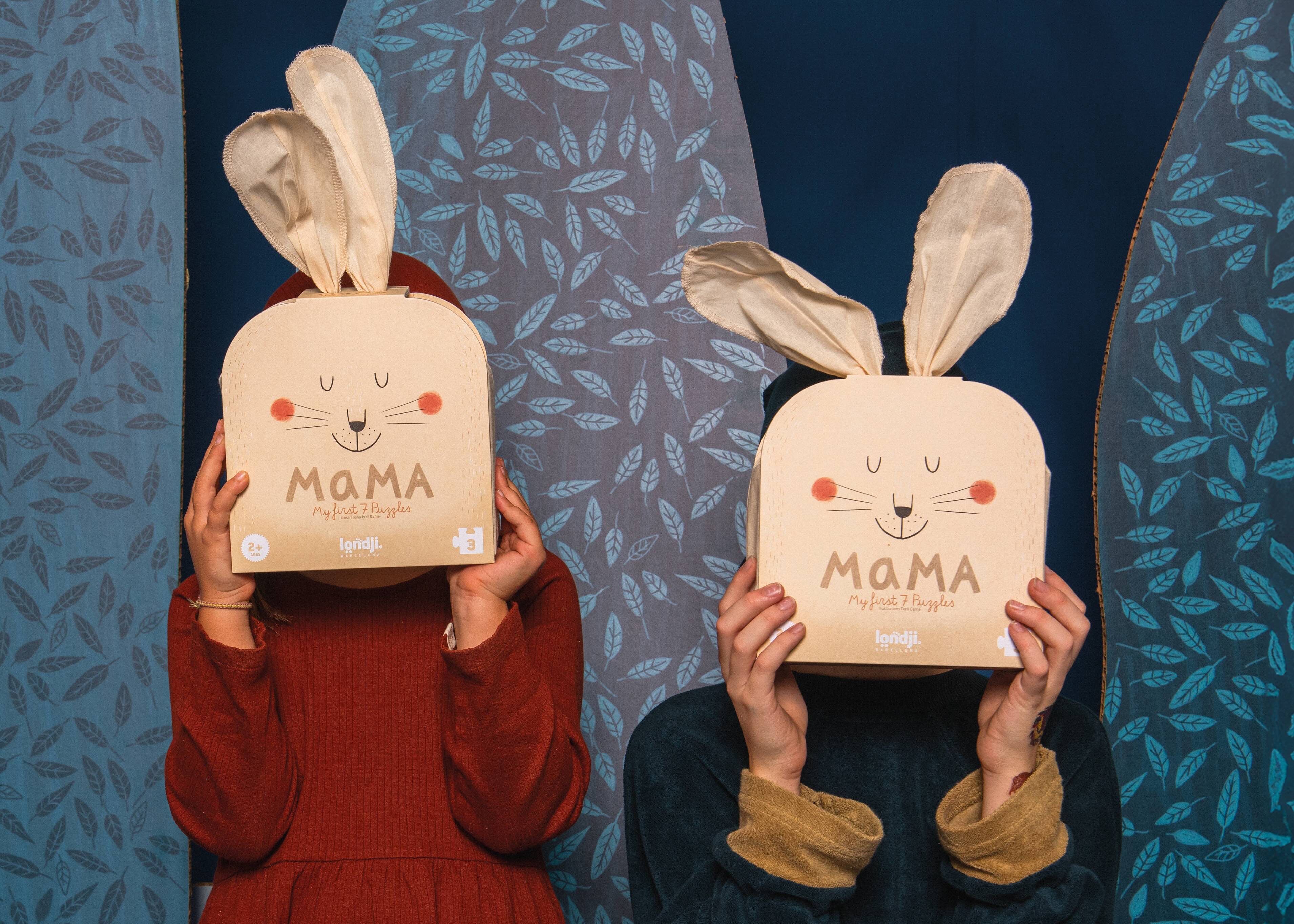 Londji puzzle - two people holding bags with bunny ears and 'MAMA' text against a patterned background