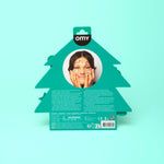 Green OMY tree-shaped packaging with a child's face on a light blue background
