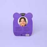 Purple bear-shaped OMY sticker packet with a face on it against a purple background