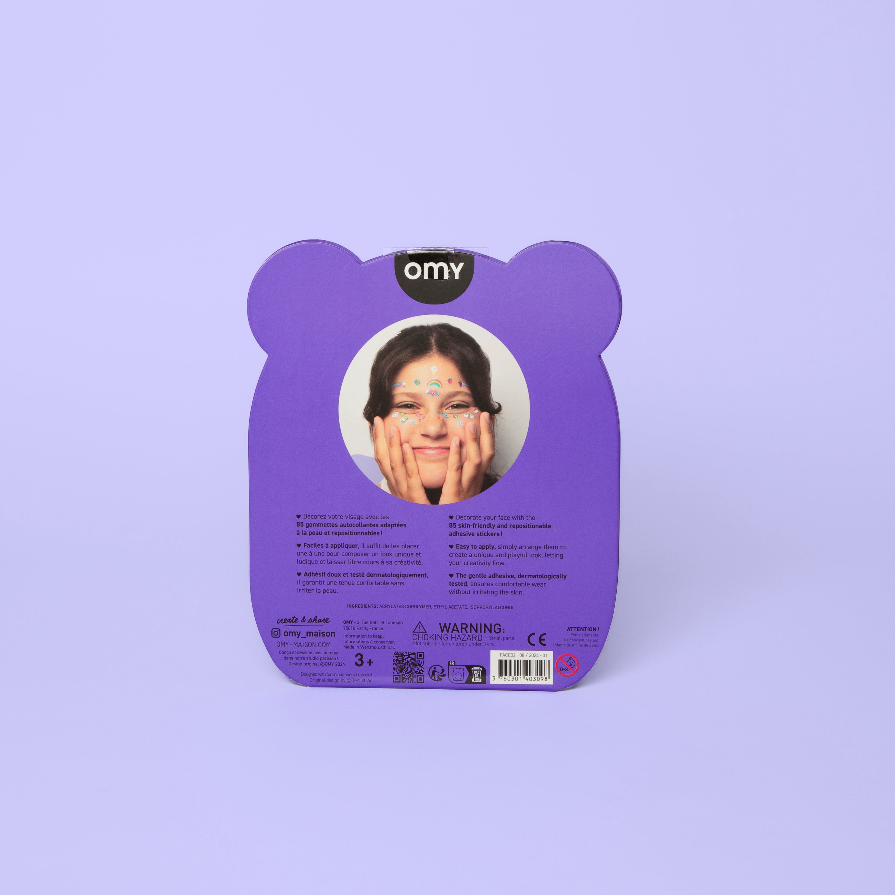 Purple bear-shaped OMY sticker packet with a face on it against a purple background