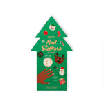 Green Christmas tree-shaped pack of OMY nail stickers with festive designs on a white background