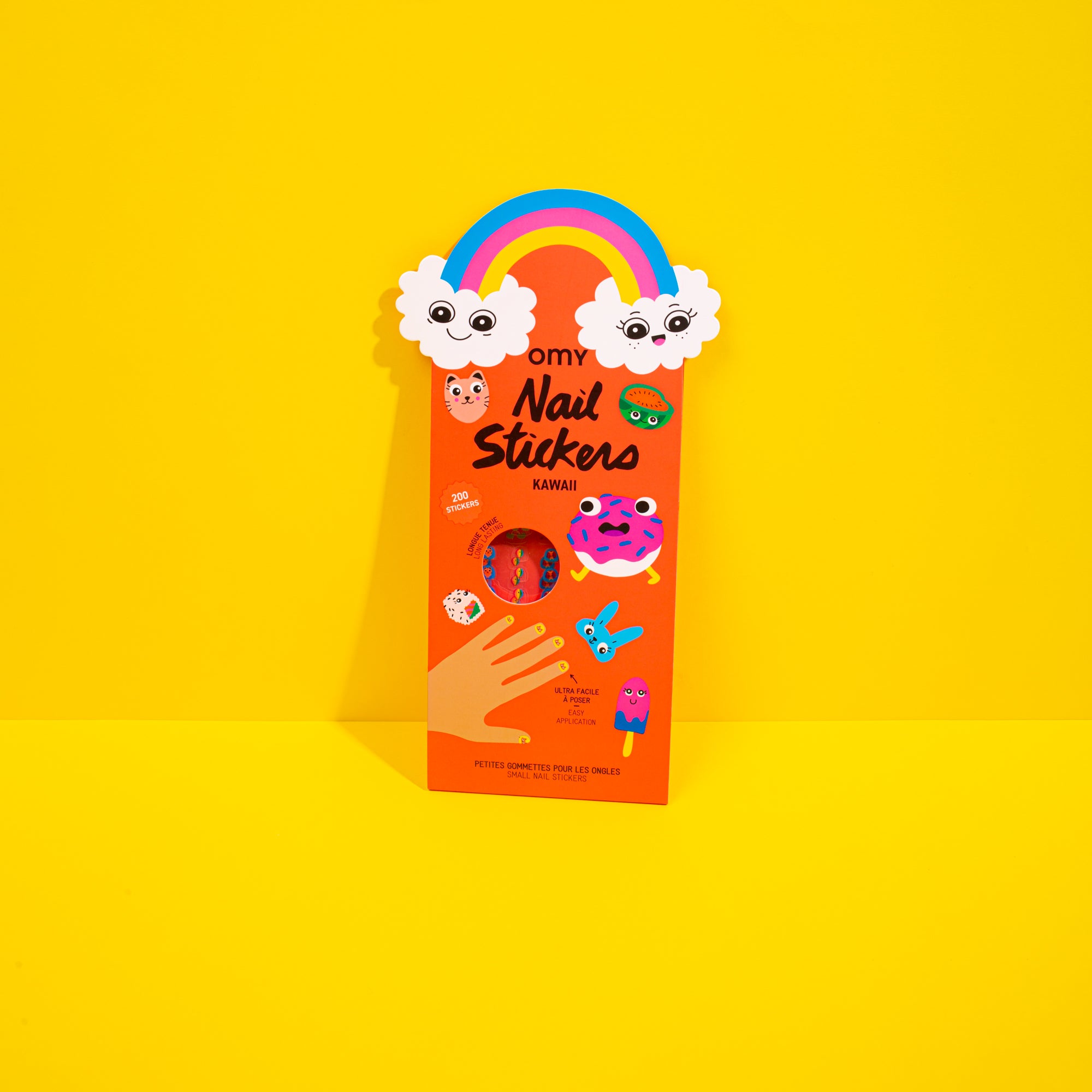 Pack of OMY nail stickers with cartoon characters on a yellow background