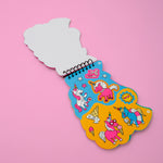 OMY children's activity book with colorful stickers on a pink background