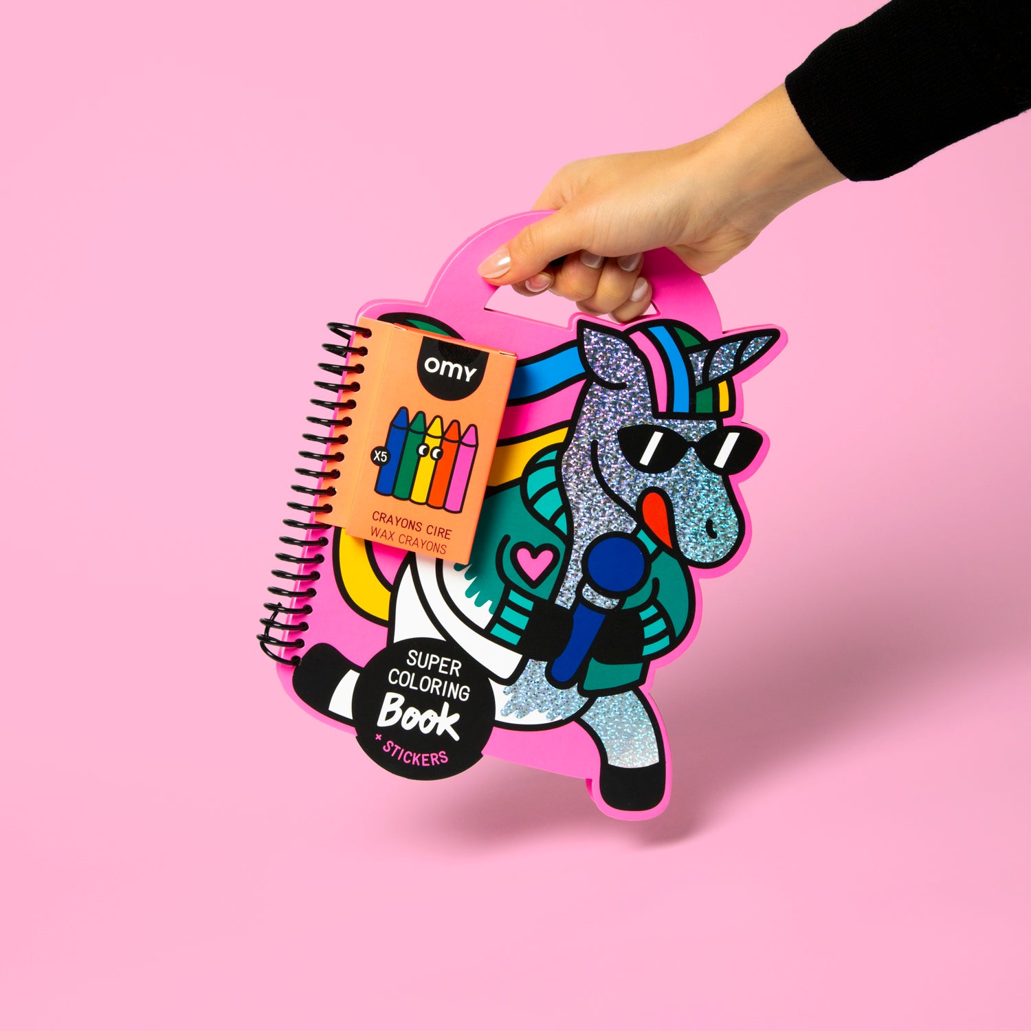 OMY coloring book and crayons set with a unicorn design on a pink background