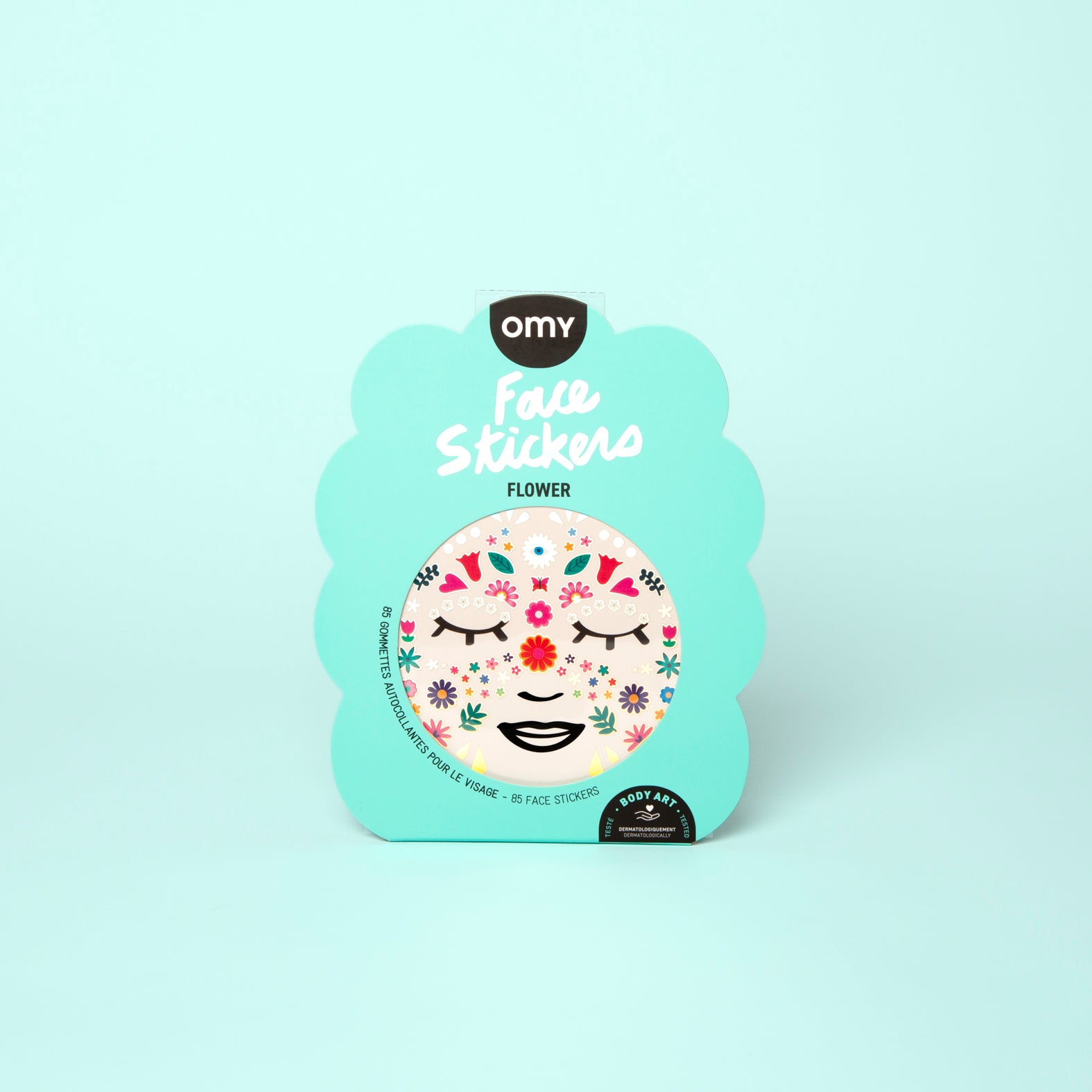 Pack of OMY face stickers with a floral design on a light green background