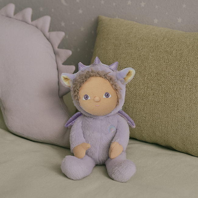Olli Ella Dinky Dinkum Doll Duffy Dragon sat on bed